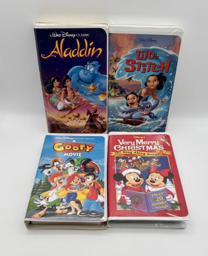 LOT OF 4 - Disney Movies - Aladdin, Lilo & Stitch, Goofy, Mickey Sing Along